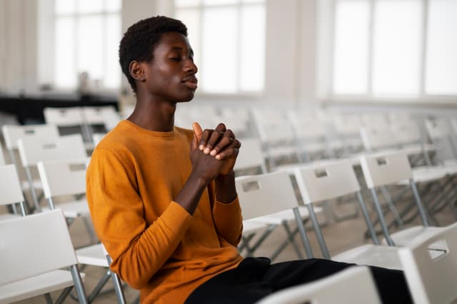 A young man praying